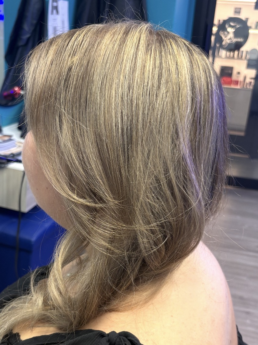 Dimensional blonde highlights on medium length hair