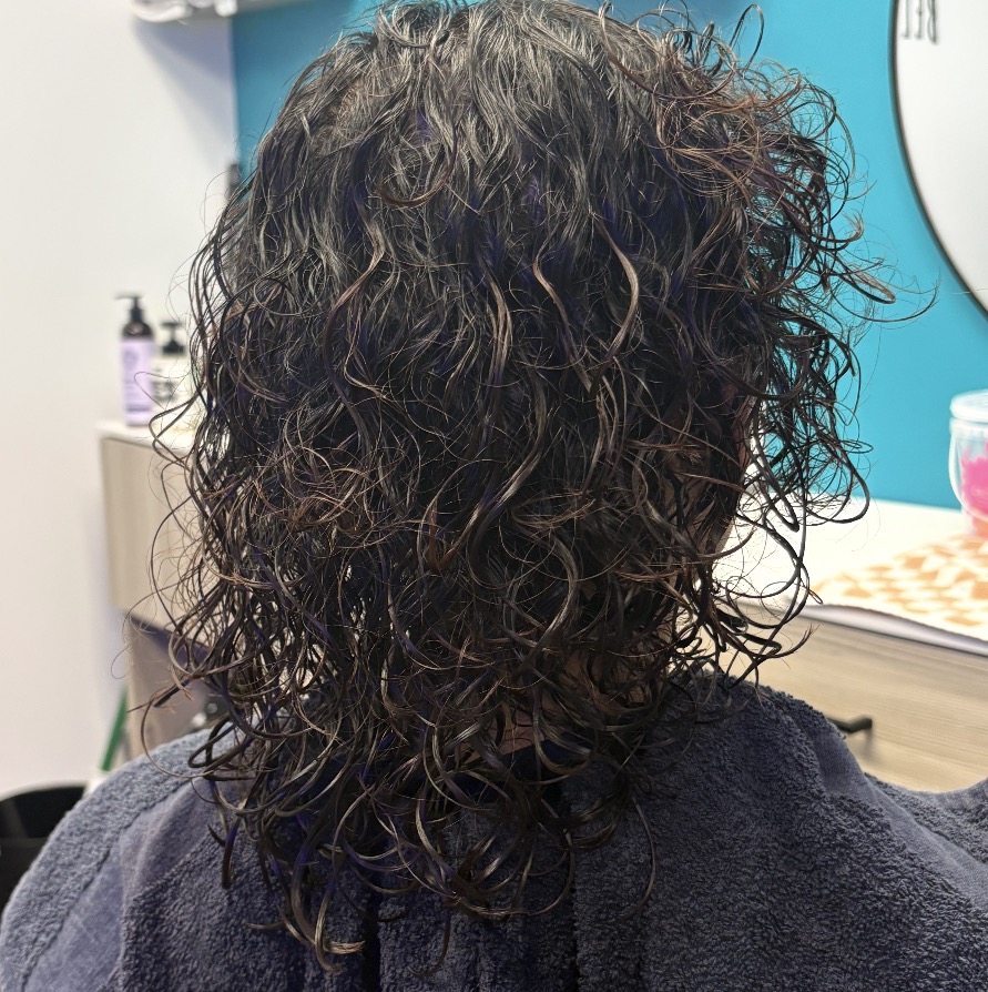 Fresh curly perm with defined ringlets