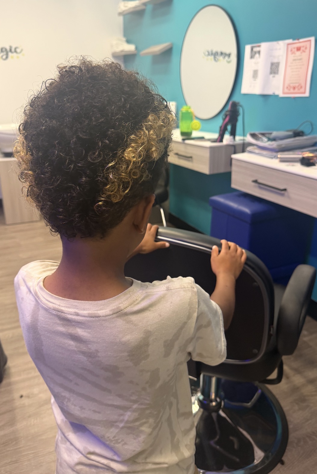 Kids curly cut with blonde tips